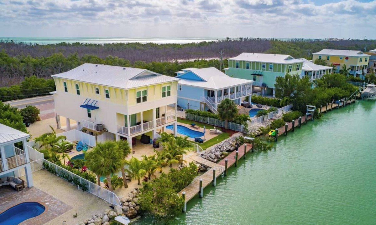 Marathon Villa | Canal Front with Large Custom Pool, Lush Landscaping, Hot Tub, 30' Dock, Kayaks!