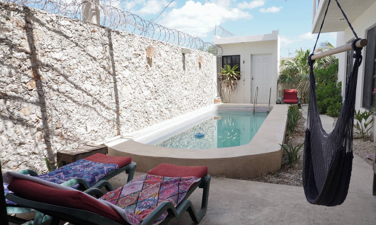 Chicxulub Puerto House | Casa Calandria, a beautiful quiet home with swimming pool & near the beach