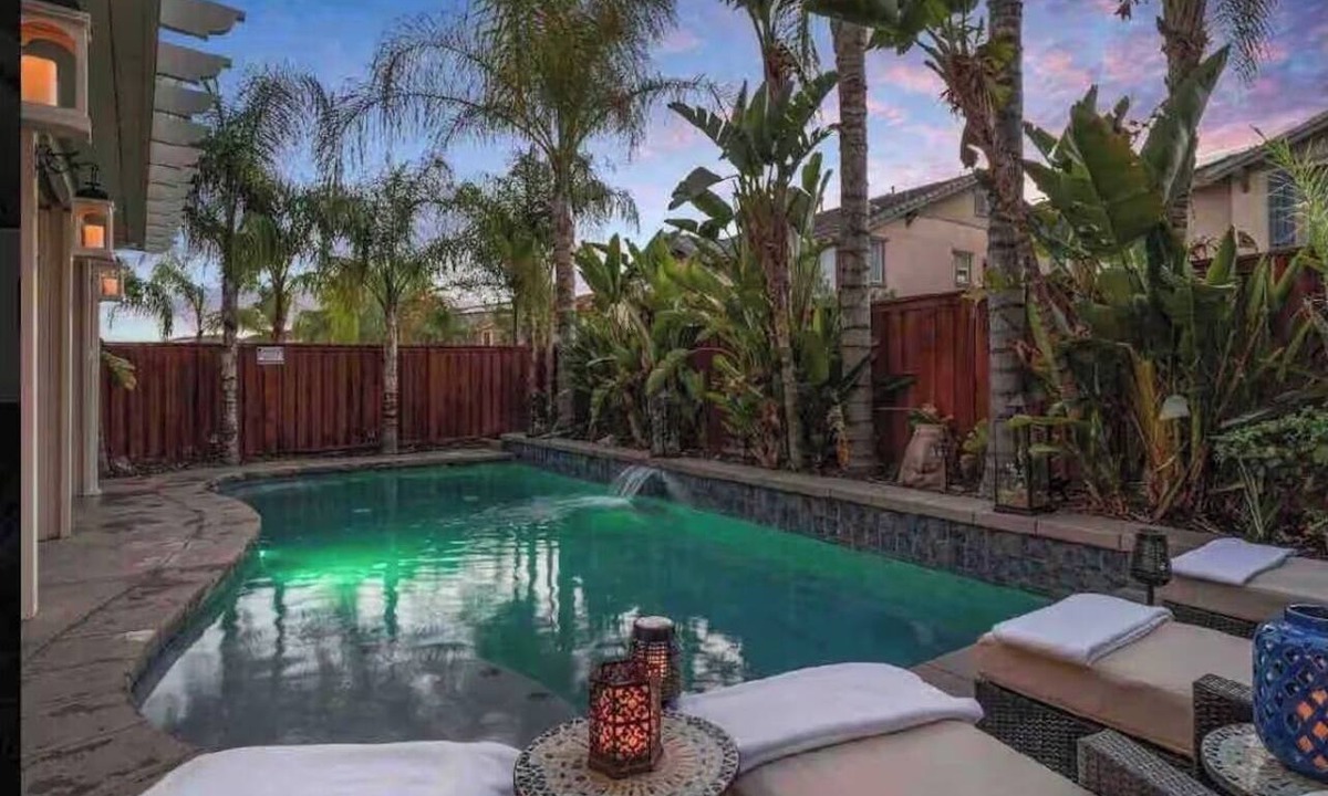Lake Elsinore House | Kimberly's Chandelier Château Salt Pool & XL Hot Tub