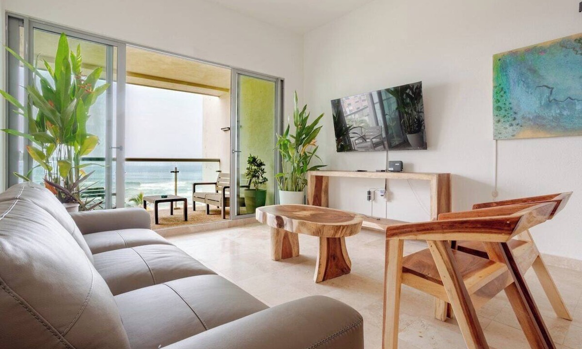 Playa Diamante Apartment | Oceanfront condo with a pool, hot tub, and spectacular view