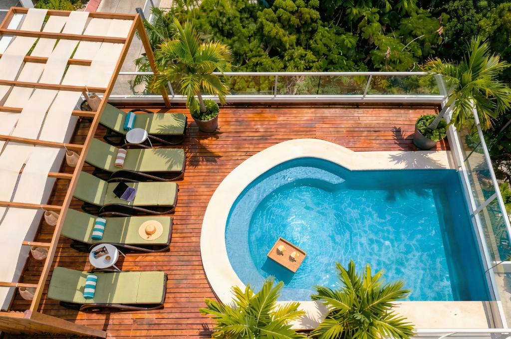 Luis Donaldo Colosio Apartment | Pool & Patio 1BR 2BR Suites Sleeps 2-8, Beach & 5th Ave 10 Min, New Chedraui 15 Min, Kitchen WiFi AC