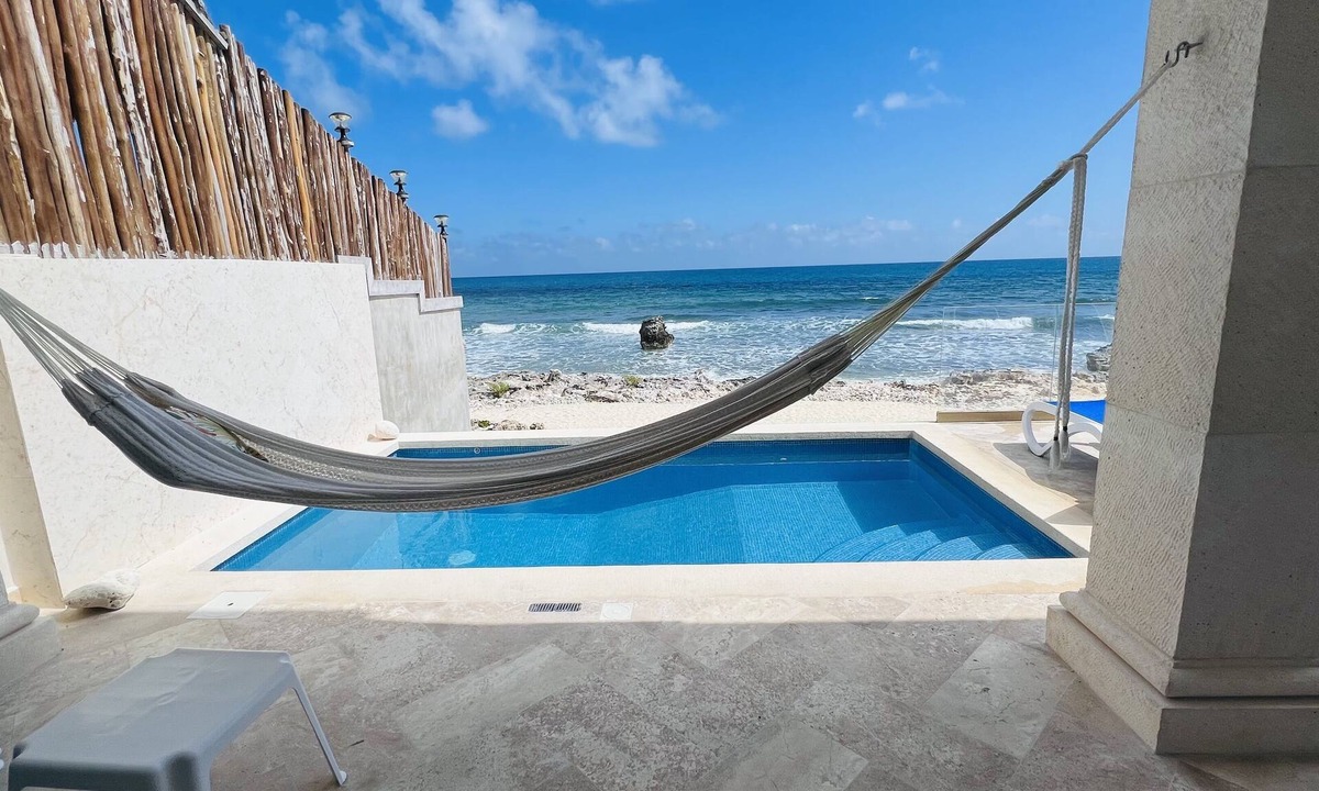 Isla Mujeres House | Steps to Sand- Serene Beachfront Getaway in Isla Mujeres, Mexico.