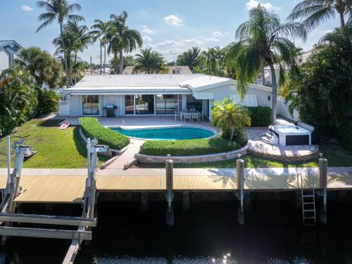 Lighthouse Point Villa | Waterfront Luxe 3BR, Pool, Hot Tub & Dock