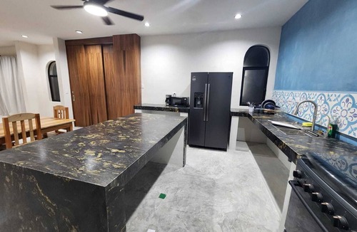 El Cuyo Apartment | 1-bedroom penthouse with AC, pool, close to the beach and town in El Cuyo