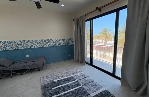 El Cuyo Apartment | 1-bedroom penthouse with AC, pool, close to the beach and town in El Cuyo