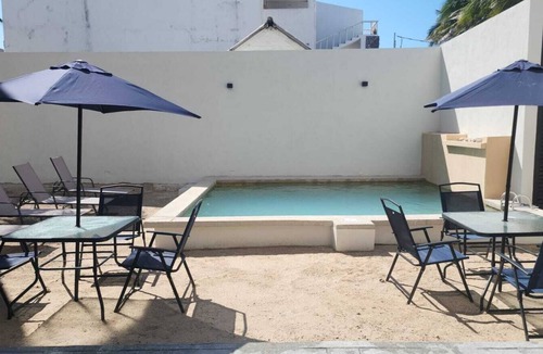 El Cuyo Apartment | 1-bedroom penthouse with AC, pool, close to the beach and town in El Cuyo