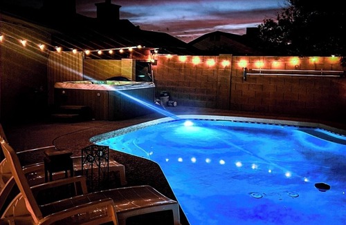 La Buena Vida House | 8 minute walk to State Farm Stadium, 5 rooms 7 bed home with pool/spa/game room
