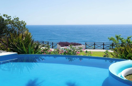 Santa Maria Huatulco House | An exclusive beach house, perched on a cliff with panoramic ocean views.