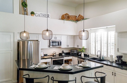 Tatum Square House | Backyard Paradise: Heated Pool, Hot Tub, EV Charger, 3 Miles to Mayo Clinic