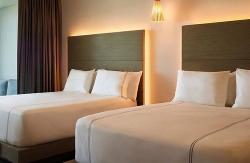 Punta Sam Hotel | Beachfront Family Haven Near Punta Sam & Golf Club