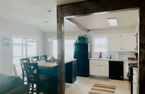 Checotah House | Best sunset on the Lake! Waterfront Home Private Boat Dock, Fire Pit and More!