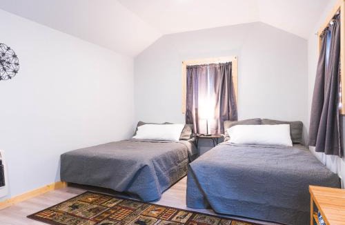 Susitna North Hotel | Cache Cabins