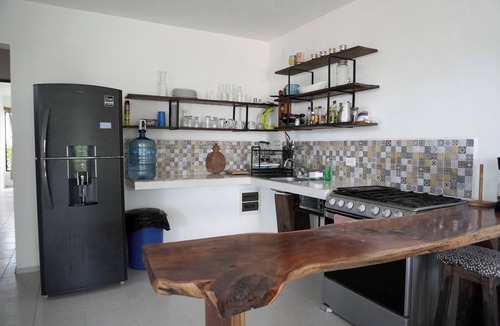 Chicxulub Puerto House | Casa Calandria, a beautiful quiet home with swimming pool & near the beach
