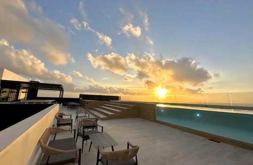 Centro Apartment | Comfortable Condo W/City Views Rooftop Pool & Gym - 319 Musa