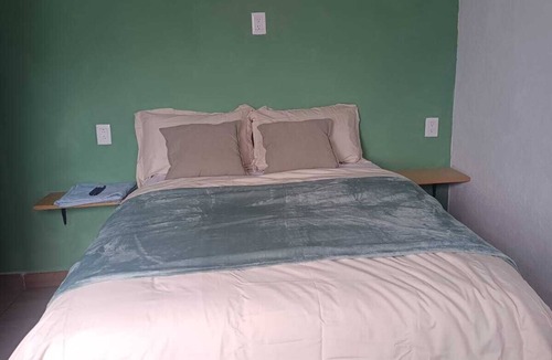 Queretaro Apartment | Comfortable room with private bathroom next to plaza candiles in Querétaro