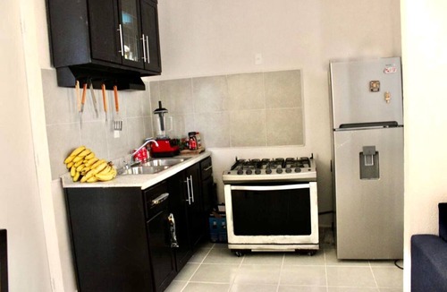 Puerto Juarez Apartment | Confort Condo with semi-Olympic pool, Wifi, AC, Grill, Balcony, Garden