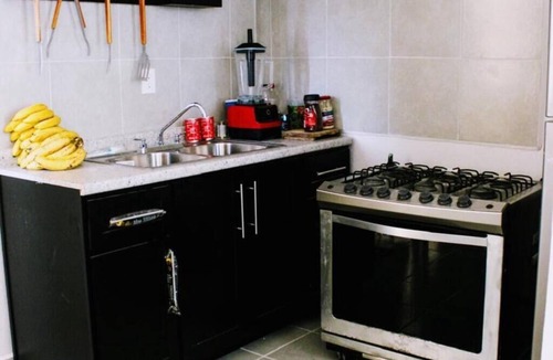 Puerto Juarez Apartment | Confort Condo with semi-Olympic pool, Wifi, AC, Grill, Balcony, Garden