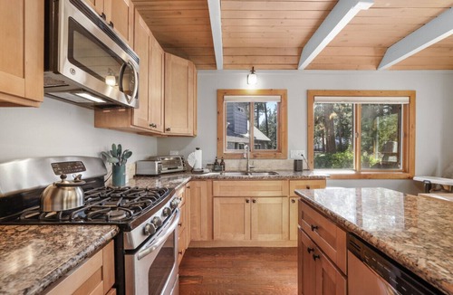 Pioneer Trail House | Cozy Cabin on Brule - Hot Tub, Jungle Gym & Games