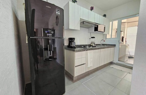 Puerto Juarez Apartment | Dept. Bohemian in front of the pool, luxury amenities
