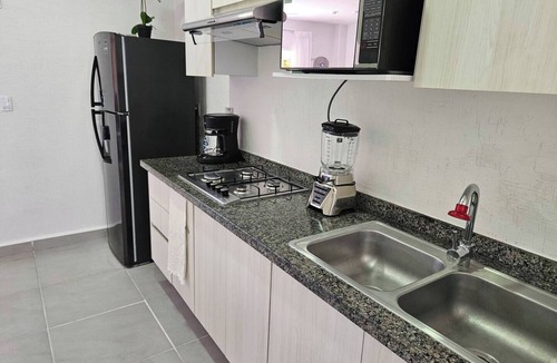 Puerto Juarez Apartment | Dept. Bohemian in front of the pool, luxury amenities