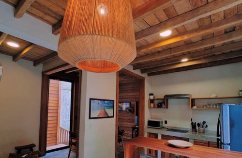 Isla Holbox House | Eco‑Chic Wood 3BR Casa with Pool & Rooftop views