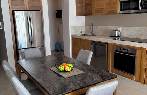 Crucecita Apartment | Elegant 2BR Marina-view condo
