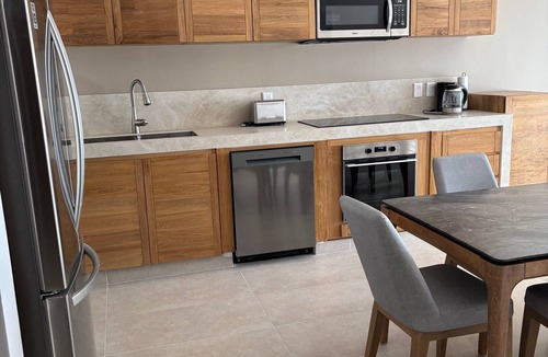 Crucecita Apartment | Elegant 2BR Marina-view condo