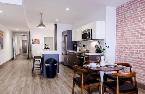 Historic Core Apartment | Exposed Brick Loft-Style Space | Private Balcony!