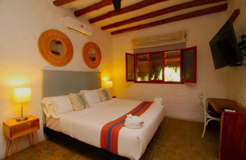 Downtown Holbox Hotel | La Palma Holbox WELLNES SUITES & APARTMENTS