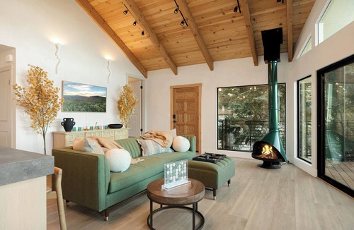 Cedar Glen Cabin | Lake views, hot tub, fire pit & fireplace, EV charger, bbq, shuffleboard, & more