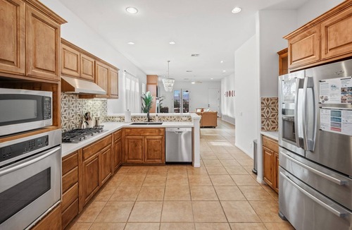 Desert Hot Springs House | Luxury Desert Pueblo! Heated Pool & Spa, Game Room, Koi Pond, 120" Movie Screen!