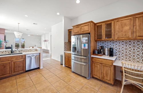 Desert Hot Springs House | Luxury Desert Pueblo! Heated Pool & Spa, Game Room, Koi Pond, 120" Movie Screen!