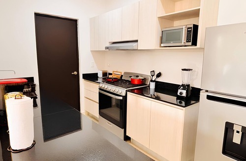Puerto Juarez Apartment | Modern Apartment with Pool for a Relaxing Stay