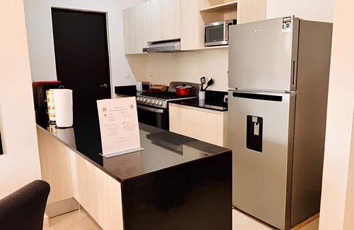 Puerto Juarez Apartment | Modern Apartment with Pool for a Relaxing Stay