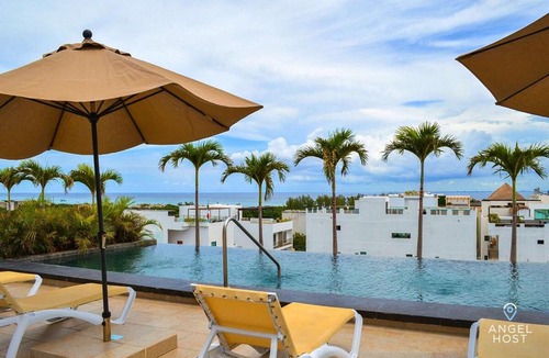 Luis Donaldo Colosio Apartment | Oceanview Roof Pool, Balcony, Steps To Beach