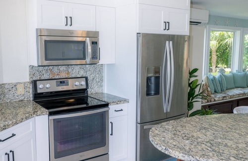 Layton House | Private Waterfront Home, Heated Pool, Beach, Tiki w/Grill, Dock, Kayaks, Sunset