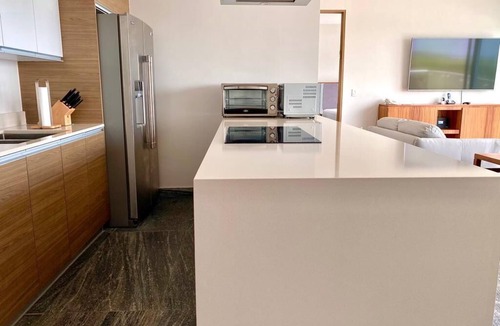 Zona Hotelera Apartment | Rooftop pool- family apartment- ocean view -close
