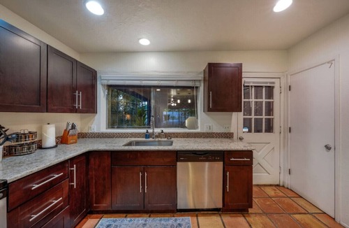 Sam Hughes House | Sam HughesA/Carport/3 BR 2 B/U of A/Fenced