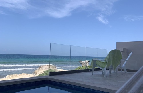 Isla Mujeres House | Steps to Sand- Serene Beachfront Getaway in Isla Mujeres, Mexico.