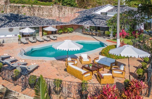 Conchas Chinas Villa | Stunning Mid-Century Modern Villa with Spacious Pool Deck & Panoramic Ocean View