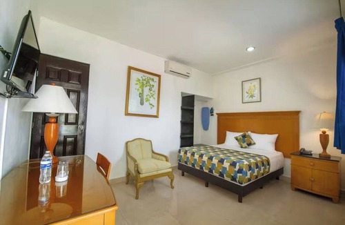 Centro Hotel | Sun-Soaked Mérida Single Room Stay: Outdoor Pool, Courtyard & Relaxing Comfort