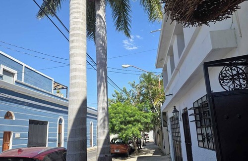 Barrio de Santiago Apartment | This poolside room features 2 queen beds, a large closet, and a private bathroom,