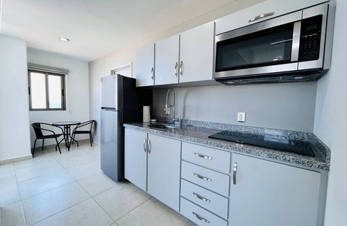Zona Dorada Apartment | Tramonto 501 | Depa centrico con vista a ciudad