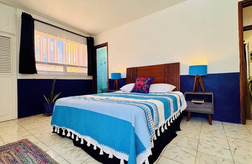 Centro Bed & Breakfast | Tropical Mid-Century Modern B&B in Merida's Centro, Azul
