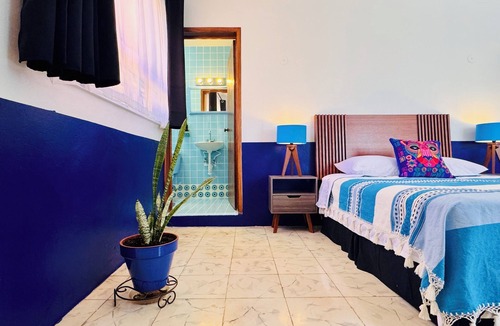 Centro Bed & Breakfast | Tropical Mid-Century Modern B&B in Merida's Centro, Azul