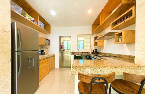 Puerto Juarez Villa | Villa Selvática con Piscina en Playa del Carmen