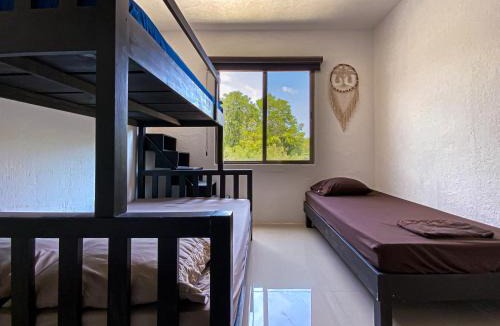 Puerto Juarez Villa | Villa Selvática con Piscina en Playa del Carmen