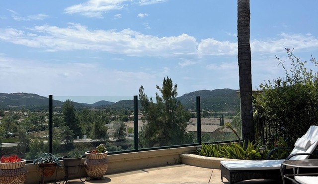 180-degree mountain views from heated spa to overlook the exquisite golf course.