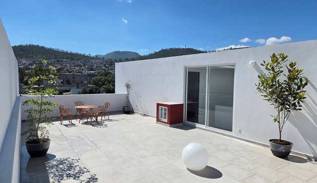 5-bedroom, 5-bathroom home with a rooftop garden offering panoramic views and a 2-car garage in Pachuca de Soto