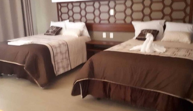 9 Estrellas Hotel